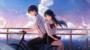 Cute Anime Couple Sharing A Bicycle Wallpaper