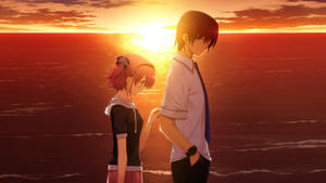 Cute Anime Couple Together At Sunset Wallpaper