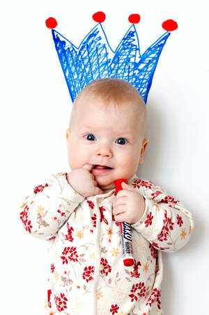 Cute Baby Portrait With Blue Crown Doodle Wallpaper