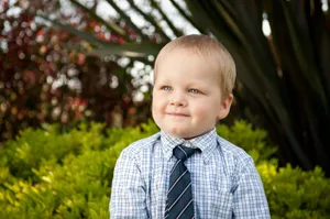 Cute Boy Wearing Shirt And Tie Wallpaper