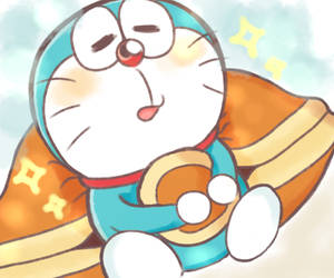 Cute Doraemon Leaning On Big Pillow Wallpaper