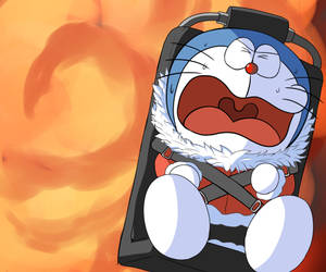 Cute Doraemon Strapped On Sleigh Wallpaper