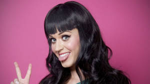 Cute Katy Perry With Peace Sign Wallpaper