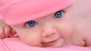 Cute Pink Baby Girl Blue Eyes Wallpaper