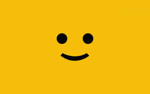 Cute Plain Yellow Smiley Face Wallpaper