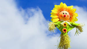 Cute Spring Flower Scarecrow Wallpaper