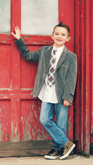 Cute Stylish Boy Wearing Suit Wallpaper
