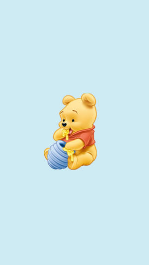 Cute Winnie The Pooh Eating Honey Wallpaper