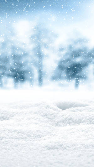 Cute Winter Iphone Snow On Ground Wallpaper