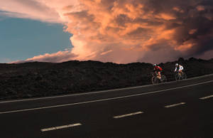 Cycling At Golden Hour Wallpaper