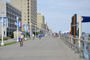 Cycling In Virginia Beach Boardwalk Near Chesapeake Wallpaper