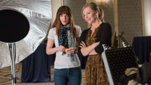 Dakota Johnson Stars As Anastasia Steele And Jamie Dornan Stars As Christian Grey In The Titular Movie, Fifty Shades Of Grey. Wallpaper