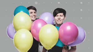 Dan And Phil Enjoying A Night Out Wallpaper