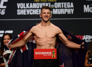 Dan Hooker Draped With Flag Wallpaper