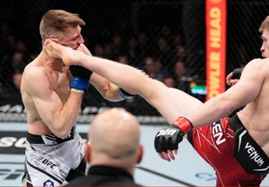 Dan Hooker Face Kick Wallpaper