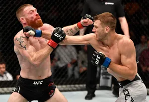 Dan Hooker Hitting Paul Felder Wallpaper