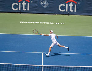 Daniel Nestor In Action At The Citi Open Tennis Tournament Wallpaper