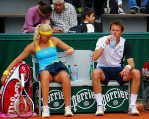 Daniel Nestor Resting With Partner Wallpaper