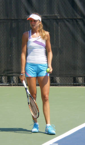 Daniela Hantuchova On Tennis Court Wallpaper