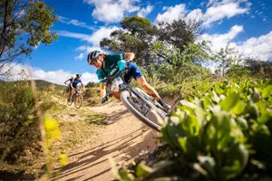 Daring Woman In 4k Mountain Bike Wallpaper