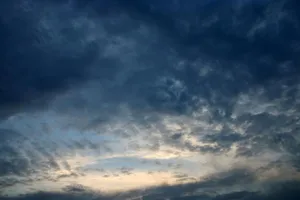 Dark Blue Clouds At Mid-day Wallpaper