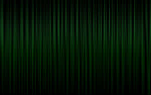 Dark Green Grunge With A Glow Of Green In The Background Wallpaper