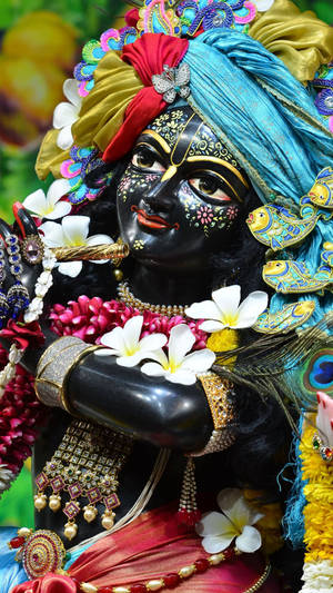 Dark Krishna With Flowers Wallpaper