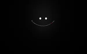 Dark Laptop Smiley With Quotes Wallpaper