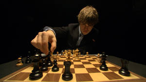 Dark Magnus Carlsen Chess Move Wallpaper