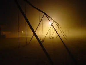 Dark Playground Swing Set Wallpaper