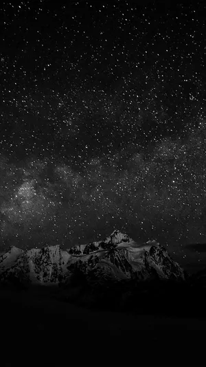 Dark Starry Night Over Snow Mountain Wallpaper