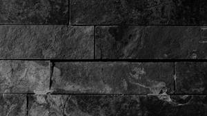 Dark Temptation: Stunning Black Brick Wall Texture Wallpaper