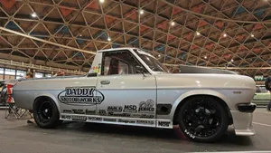 Datsun Classic Car: A Taste Of Vintage Excellence Wallpaper