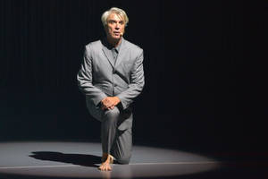 David Byrne American Utopia Kneeling Photography Wallpaper