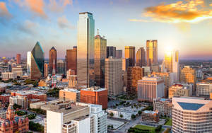 Dazzling Dallas Skyline At Twilight Wallpaper