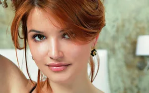 Debby Ryan Smiles In Her New Role Wallpaper