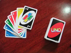 Download A Bright Yellow Reverse Uno Card Wallpaper