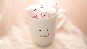 Delectable Display Of 3d Marshmallow In A White Mug Wallpaper