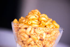 Delectable Mac And Cheese Served In A Glass Bowl Wallpaper