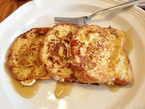 Delicious Golden French Toasts On Platter Wallpaper