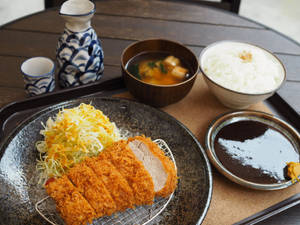 Delicious Tonkatsu Served With Tofu Side Dish Wallpaper