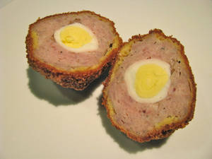 Delightful Traditional British Scotch Egg Made From Quail Wallpaper