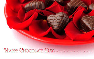 Delighting In Love's Sweetness - Heart-shaped Chocolates For Chocolate Day. Wallpaper