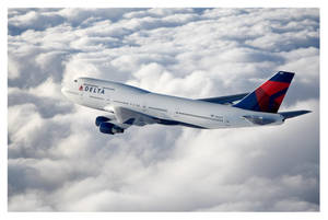 Delta Airlines Plane On Clouds Wallpaper