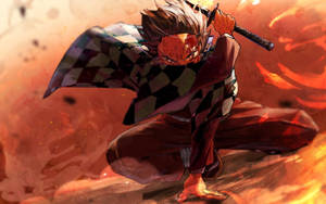 Demon Slayer Tanjiro In Combat Wallpaper