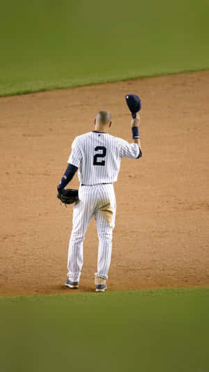 Derek Jeter Raising Hat In Field Wallpaper