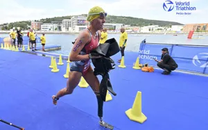 Determination Exemplified: Paralympic Triathlon Athlete In Action Wallpaper
