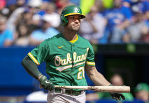 Determined Matt Olson Holding Baseball Bat Wallpaper