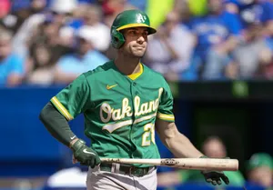 Determined Matt Olson Holding Baseball Bat Wallpaper