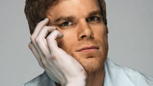 Dexter Morgan Face On White Hand Wallpaper